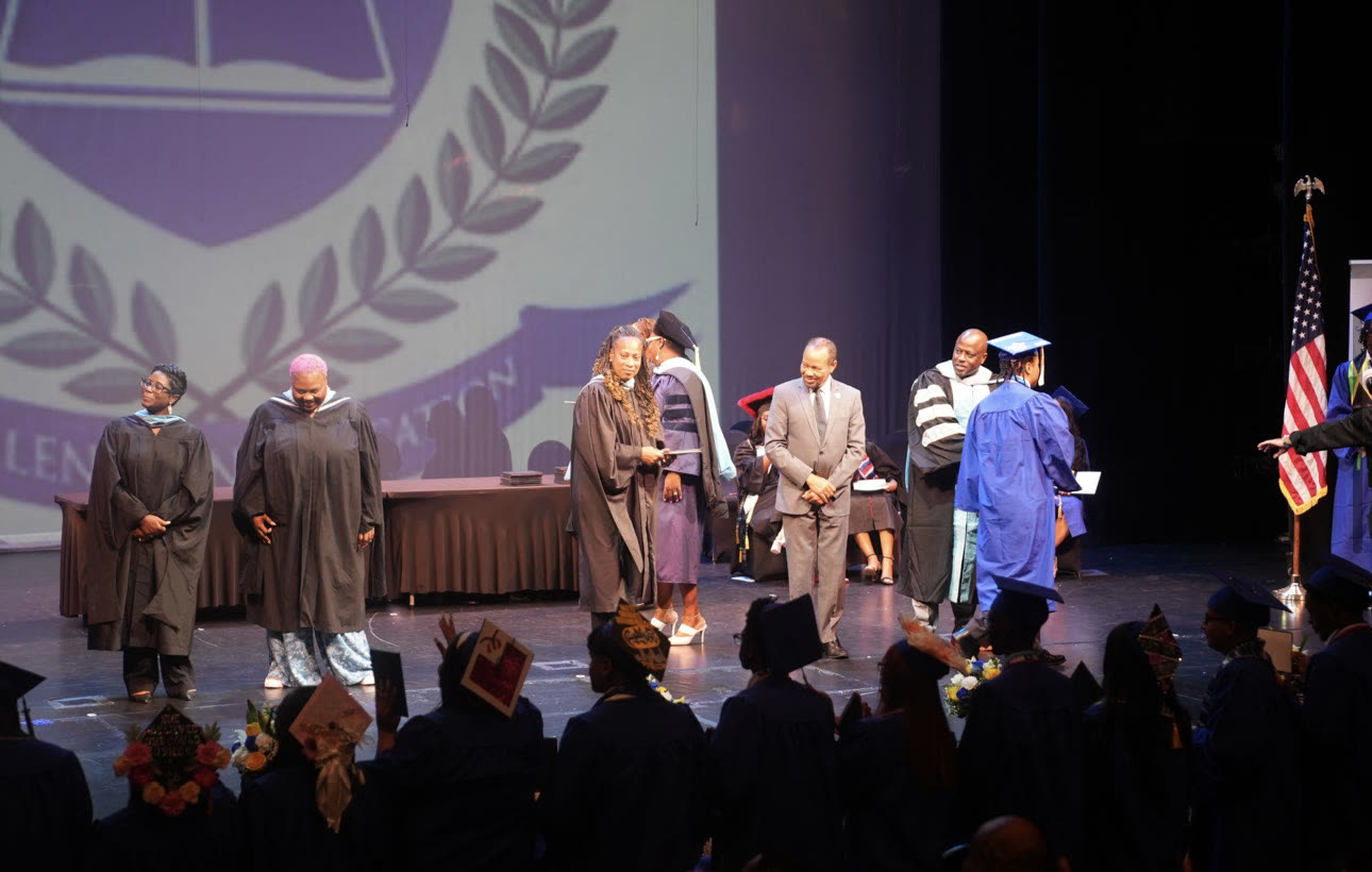 Mayor Borgelin on stage at the Somerset Prep Academy graduation