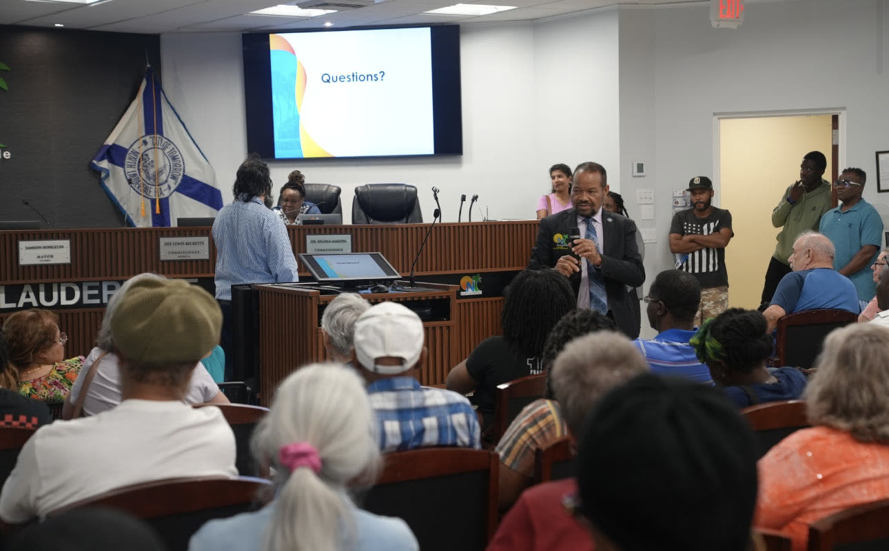 Mayor Borgelin addresses residents at a Community Reinvestment townhall